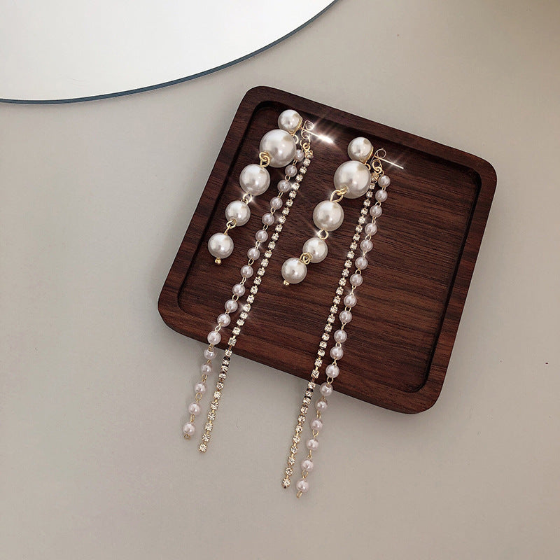 New Style Long Temperament Earrings Net Red Round Face Ear Jewelry Female Senior Sense
