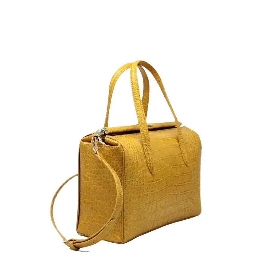 Biface rigid crocodile effect handbag