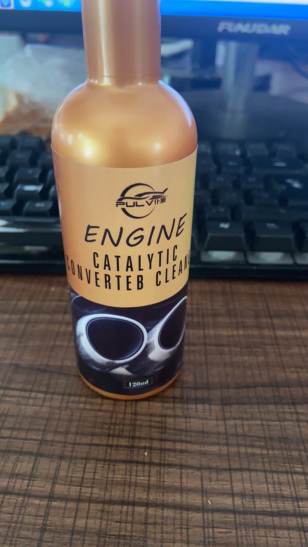 Catalytic converter cleaning agent