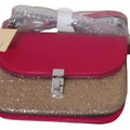 Glittery effect clutch bag