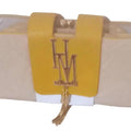 Leather effect wallet decorated with letters and metal tassel