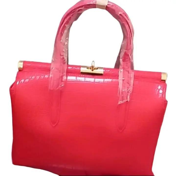 Biface rigid crocodile effect handbag